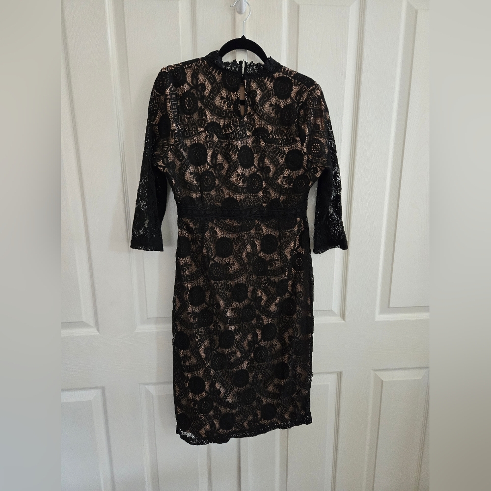 Polagram ladies Black dress with nude lining size large